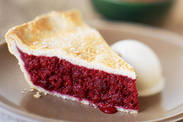 Double-crust deep red raspberry pie
